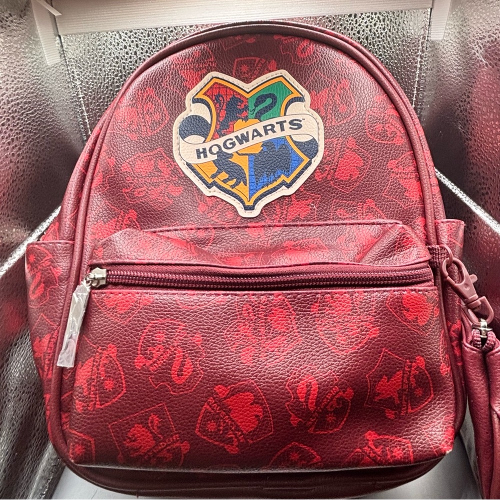 Harry Potter Hogwarts mini backpack with coin purse. New with tags.